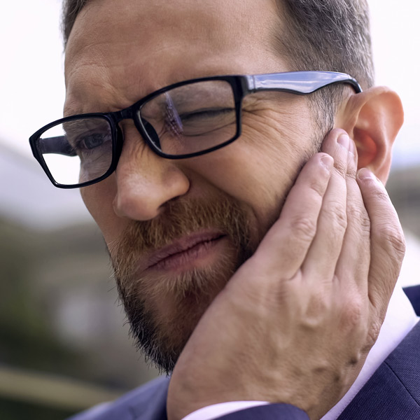 guy with ear pain