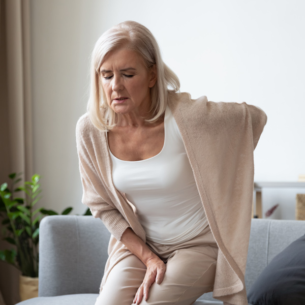 woman experiencing back pain